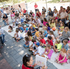 Drew Daywalt reads his latest book, The Day The Crayons Came home to a crowd of kids