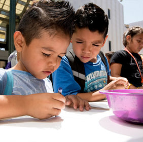 Kids coloring arts projects at Crayon Collection LACMA event